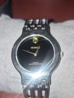 Movado Black Dial Silver Bracelet Watch with Gold Accents